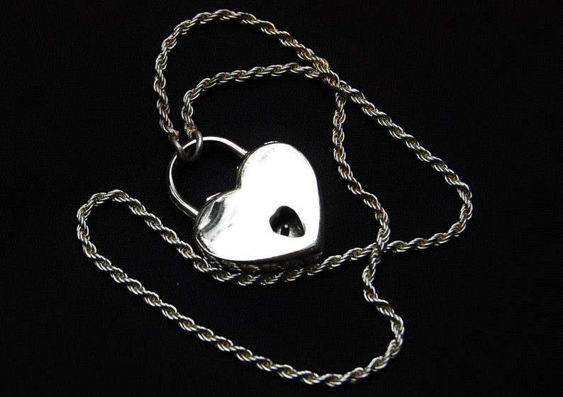 BDSM Locking Day Collar Jewelry Ankle Anklet of Lock available in solid 316L Stainless Steel or 925 sterling silver shown on a black background