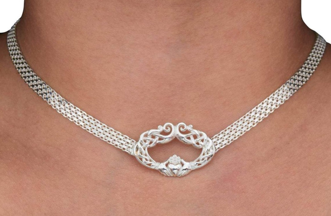 BDSM Locking Day Collar Jewelry Necklace of Lock and O ring with large sterling bell available in solid 316L Stainless Steel or 925 sterling silver shown on a model's neck