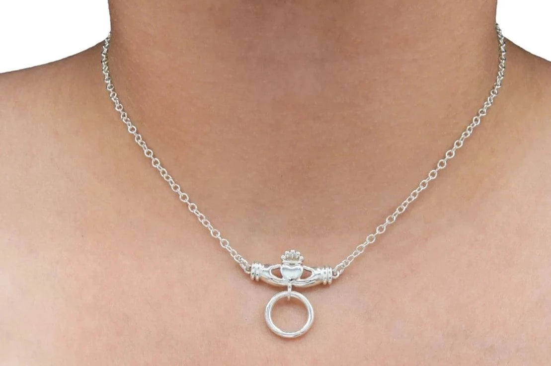 BDSM Locking Day Collar Jewelry Necklace of Lock and O ring Celtic Claddagh available in solid 316L Stainless Steel or 925 sterling silver shown on a model's neck