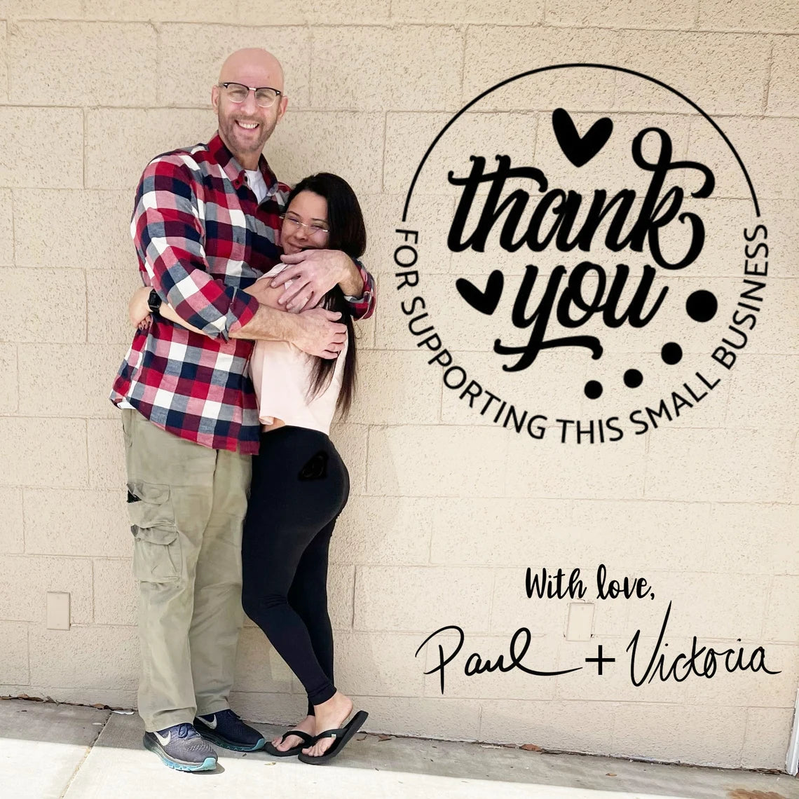 Paul and Victoria BDSM Locking Day Collar for Submissive picture of Owners hugging with smiles on their faces