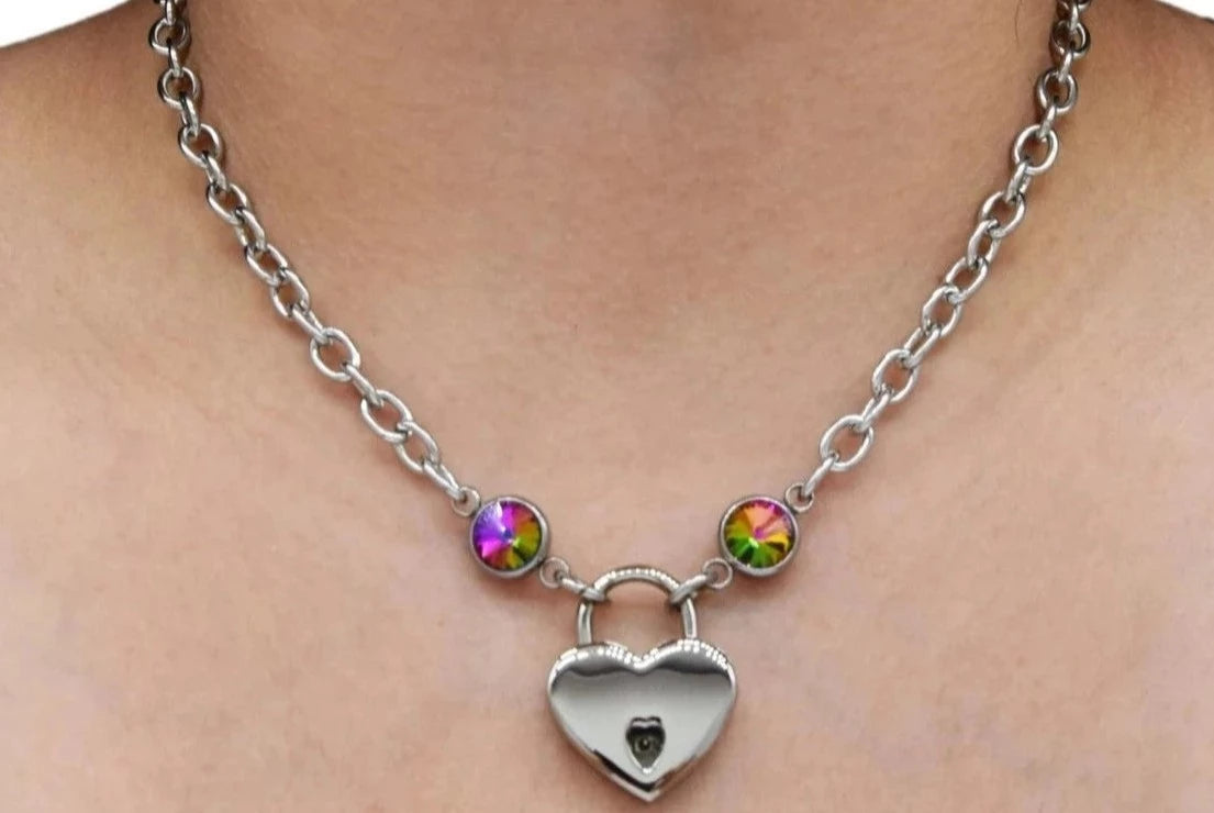 BDSM Locking Day Collar Jewelry Necklace of Lock and O ring with a rainbow cz crystal available in solid 316L Stainless Steel or 925 sterling silver shown on a model's neck