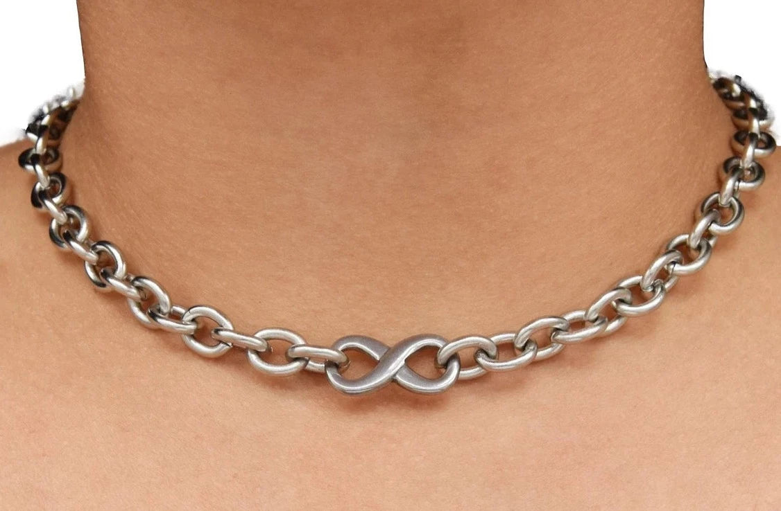 BDSM Locking Heavy Day Collar Jewelry Infinity Necklace of Lock and O ring in solid 316L Stainless Steel on a model's neck