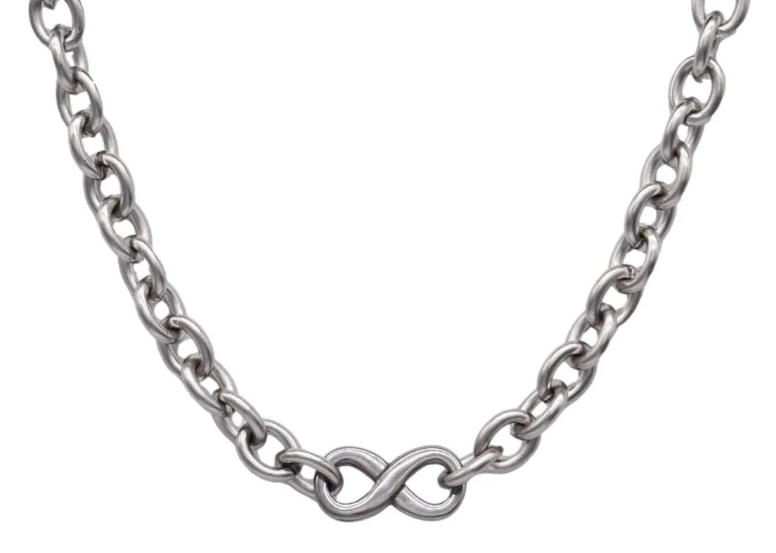 BDSM Locking Day Collar Jewelry wrist bracelet of Lock and O ring with large sterling bell available in solid 316L Stainless Steel or 925 sterling silver shown on a white background