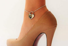 BDSM Locking Day Collar Jewelry Ankle Anklet of Lock  available in solid 316L Stainless Steel or 925 sterling silver shown on model's ankle with tan high heel shoe