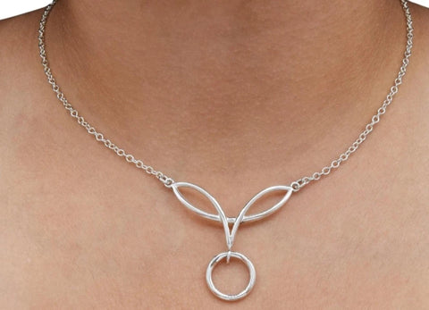 BDSM Locking Day Collar Jewelry Necklace of Lock and Celtic Knot w/ O ring with large sterling bell available in solid 316L Stainless Steel or 925 sterling silver shown on a model's neck