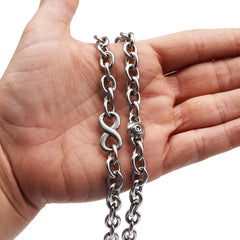 BDSM Locking  Heavy Day Collar Jewelry Infinity Necklace of Lock and O ring in solid 316L Stainless Steel on a model's hand